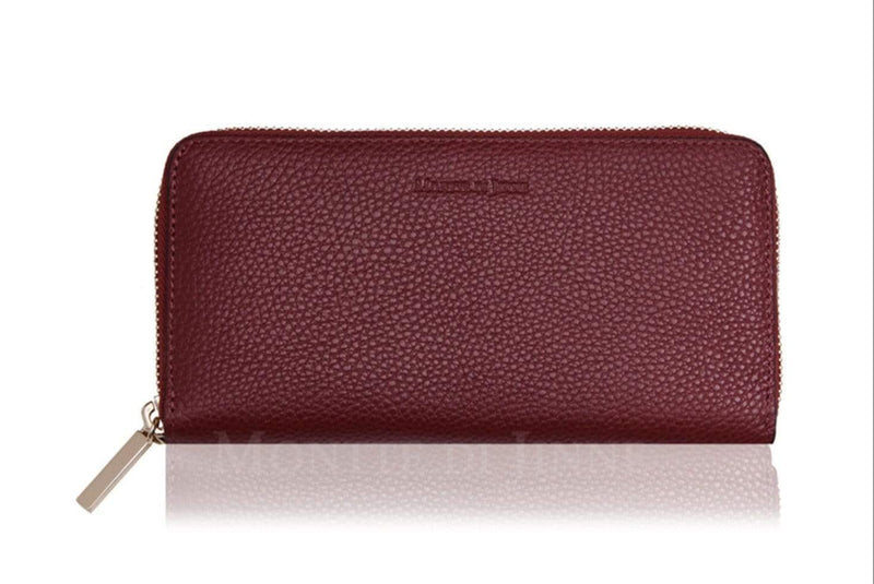 Zipped dark red leather purse