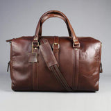 Leather holdall zip top travel bag 