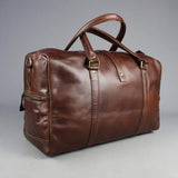 Leather holdall zip top travel bag 