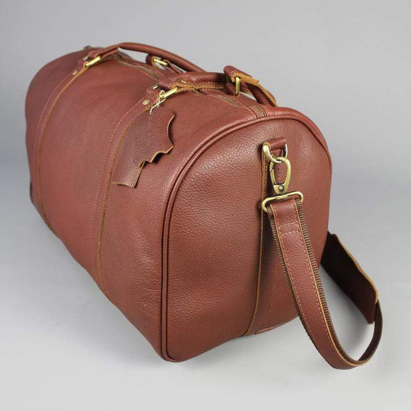 Leather holdall zip top travel bag with strap