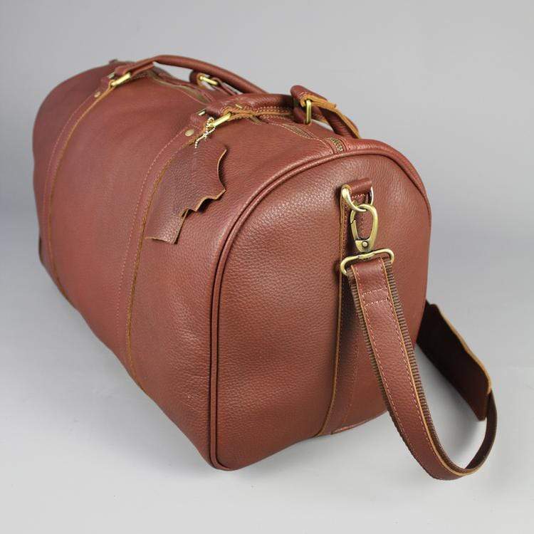 Leather holdall zip top travel bag with strap
