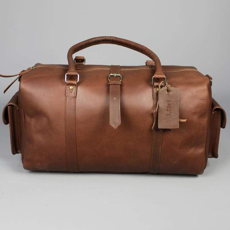 Leather holdall zip top travel bag with strap and side pockets